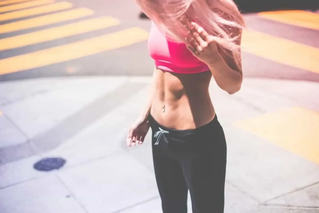 Woman with toned stomach after LA-EMS Body Sculpting Treatment Holmes Chapel